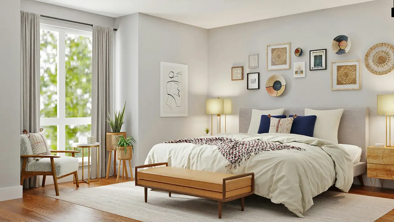 Une chambre chaleureuse avec des couleurs douces et un lit confortable.