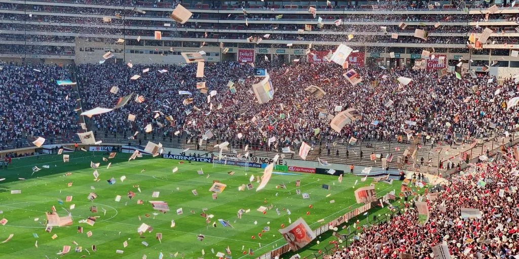 a large stadium filled with lots of people