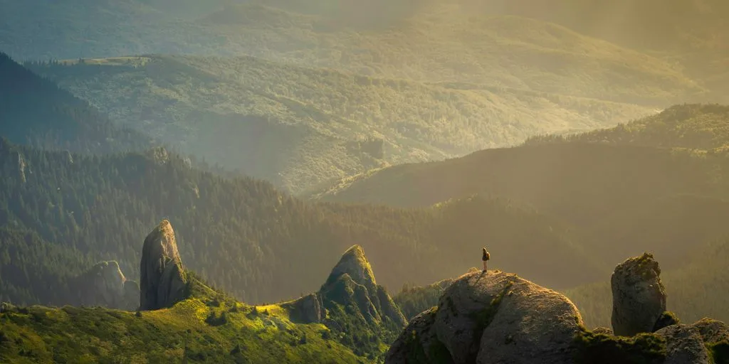 landscape photography of mountain hit by sun rays