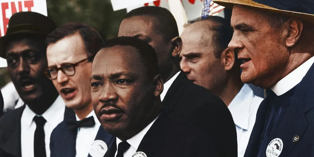 Dr. Martin Luther King, Jr. and Mathew Ahmann in a crowd of demonstrators at the March on Washington