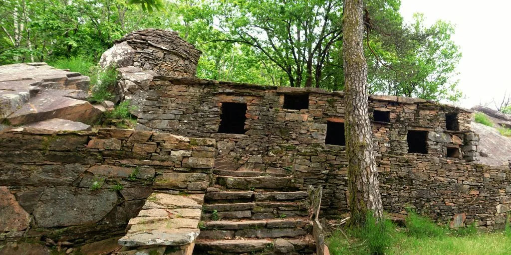 a stone building with windows