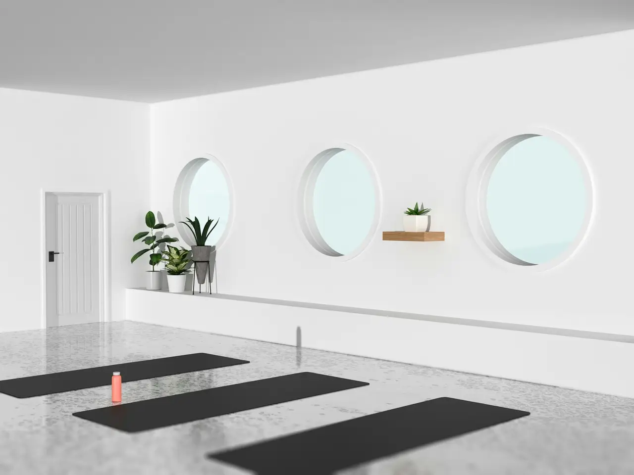 Intérieur d'un studio de yoga avec des tapis alignés